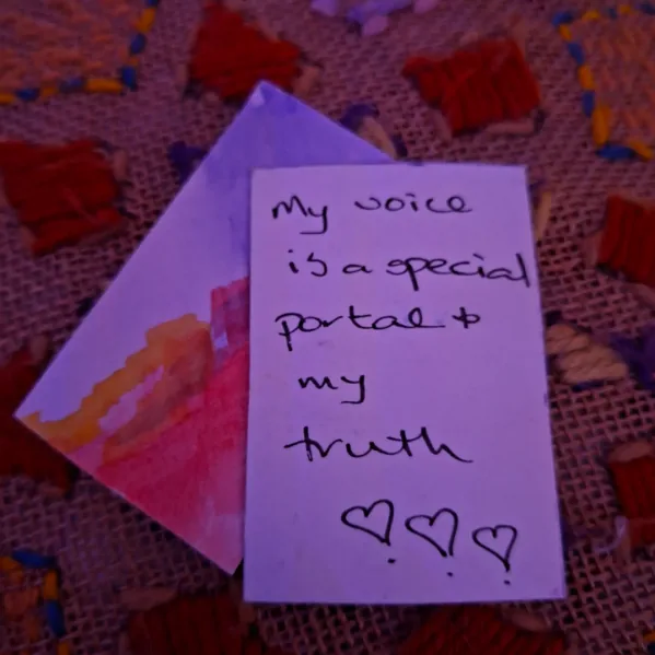 Jane’s handwritten note on a card: “My voice is a special portal to my truth”, with three hearts